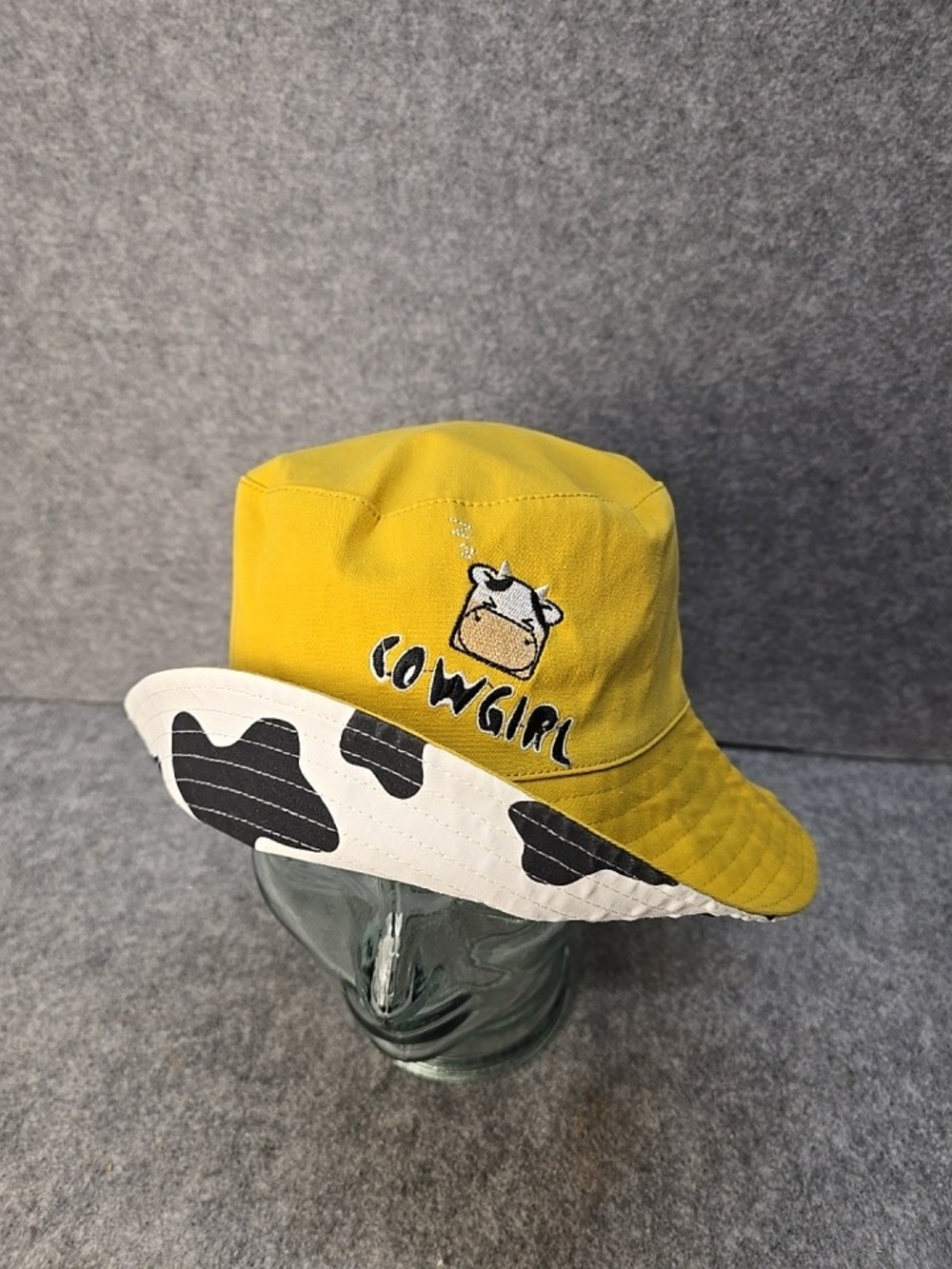 Yellow 'Cowgirl' Embroidered Bucket Hat with Black & White Cowprint Brim